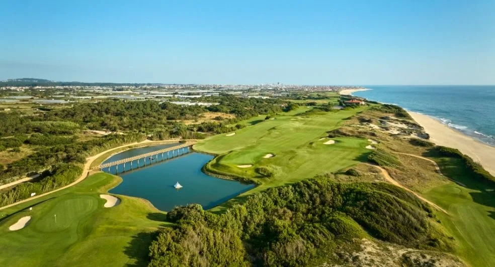 Estela Golf Club fairways and lake beside the Atlantic coast · On-site golf